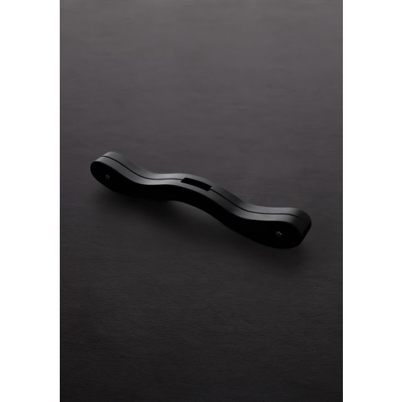 Schwarzer Holzfesselblock