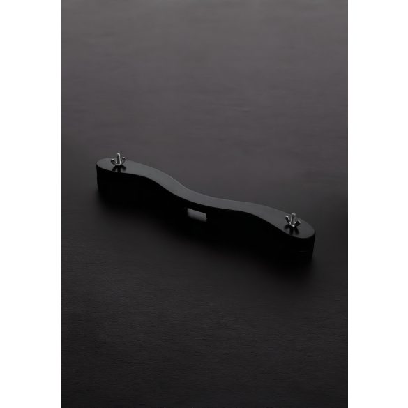 Schwarzer Holzfesselblock